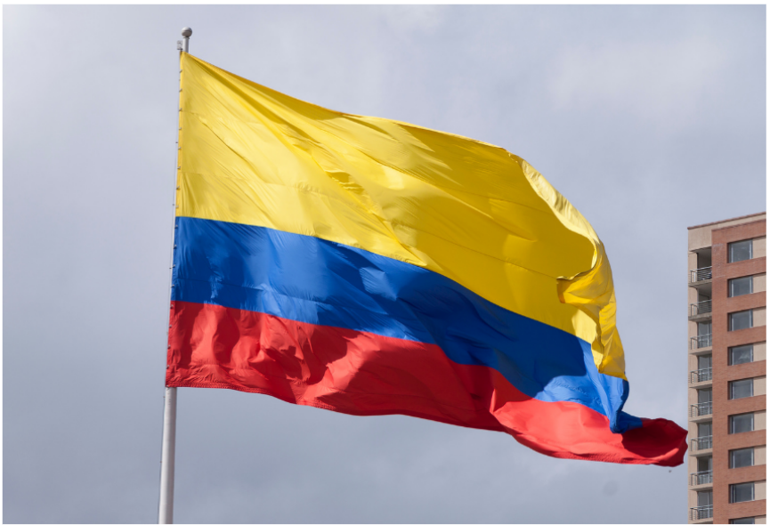 Colombian flag waving in the air. 